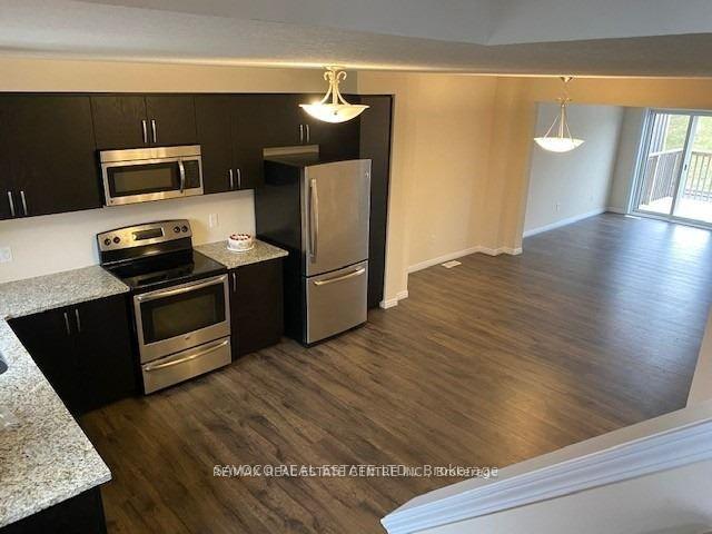 Photo 2 of 13 Eliza Avenue, Kitchener, Larentian West — HOMEH