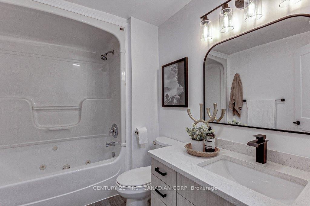 Photo 21 of 347 Thiel Street, London, East H — HOMEH