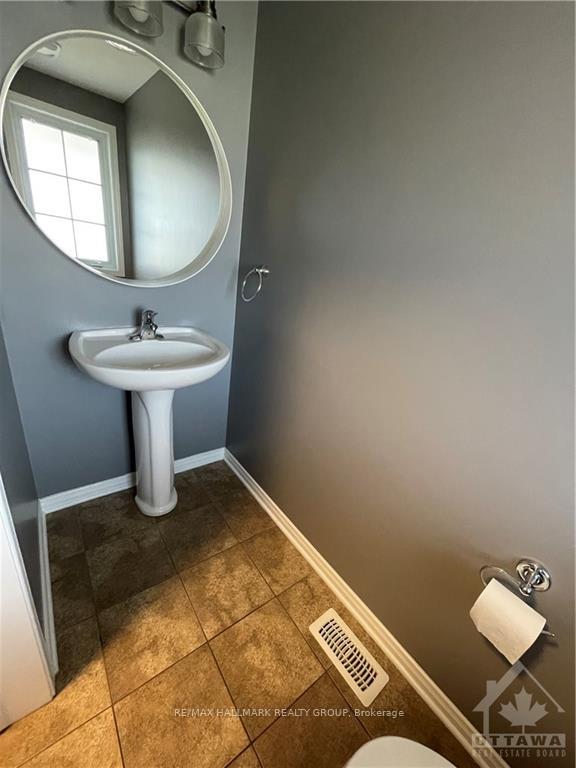 Photo 3 of 303 Tabaret Street, Ottawa, Kanata - Emerald Meadows/Trailwest — HOMEH