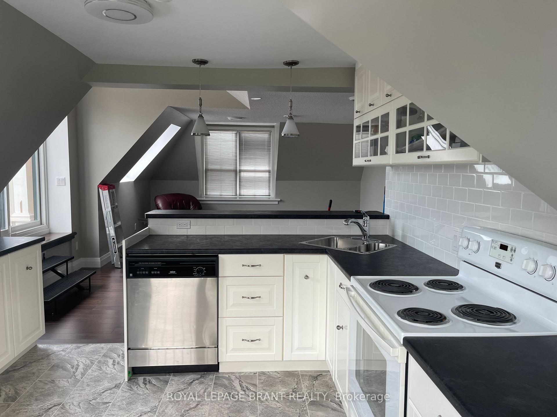 Photo 2 of Unit 5, 133 George Street, Hamilton, Strathcona — HOMEH