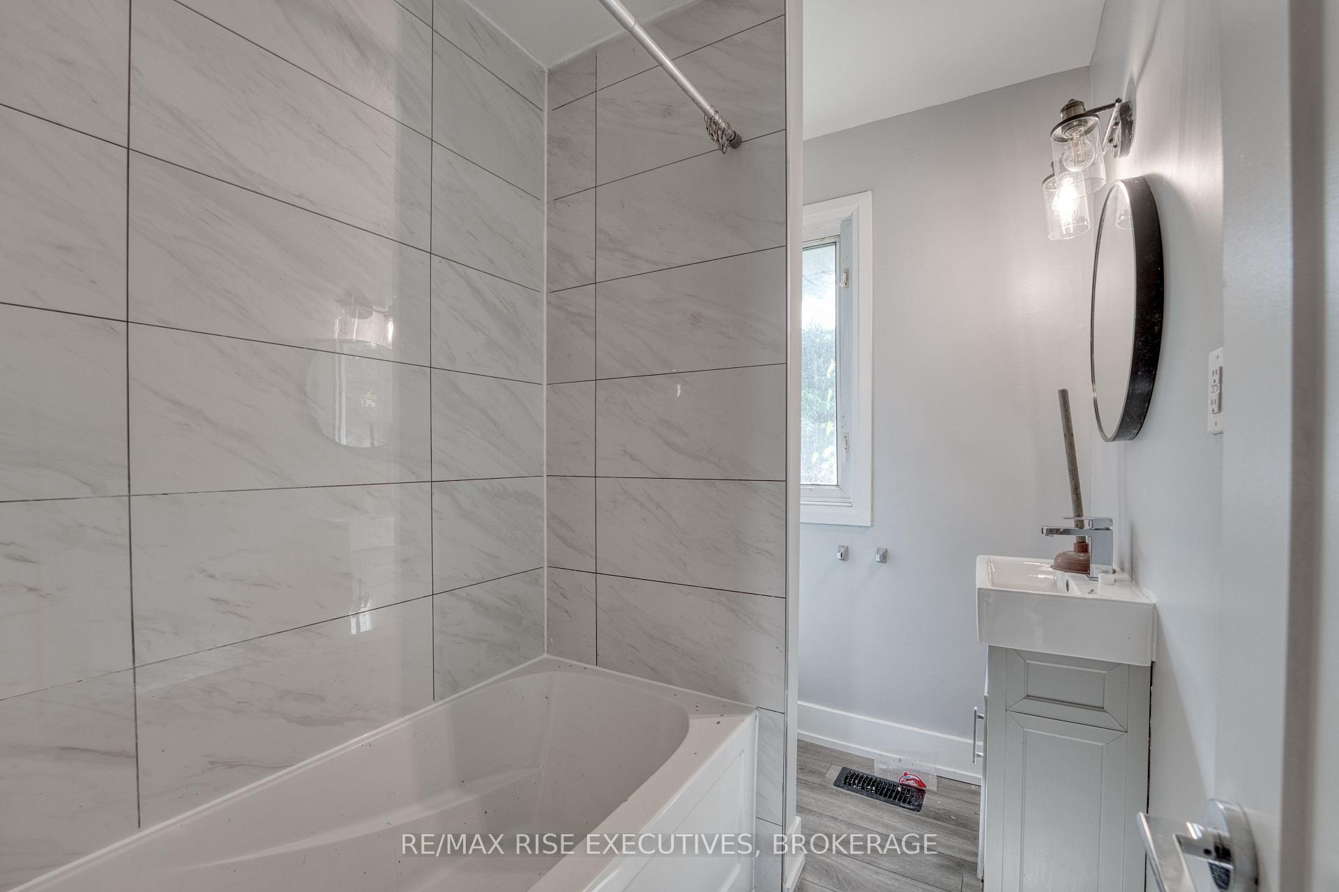 Photo 5 of Unit 1, 22 Ruskin Street, Kingston, East of Sir John A. Blvd — HOMEH