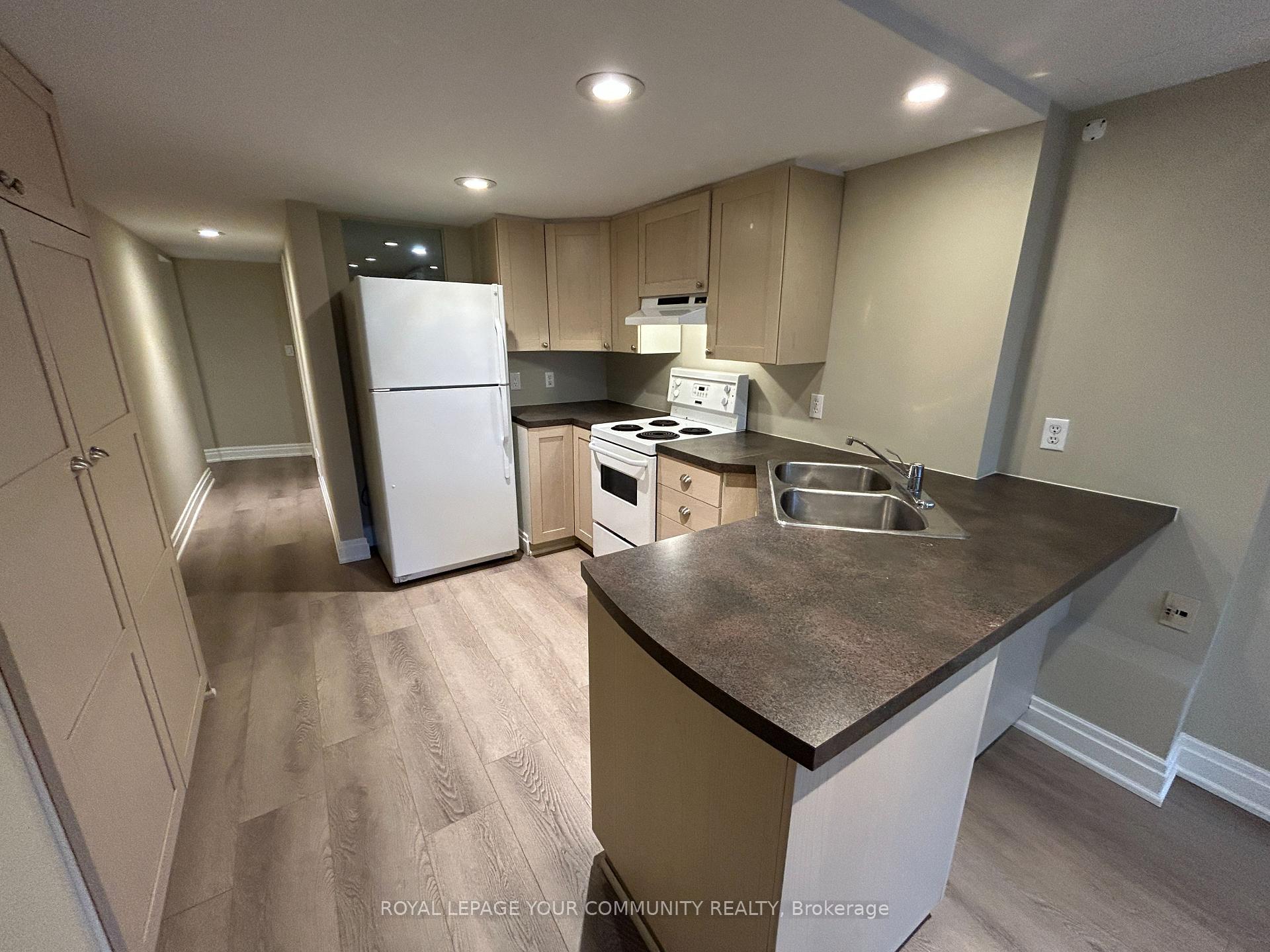 Photo 4 of Unit Lower, 2 Rougecrest Drive, Markham, Markham Village — HOMEH
