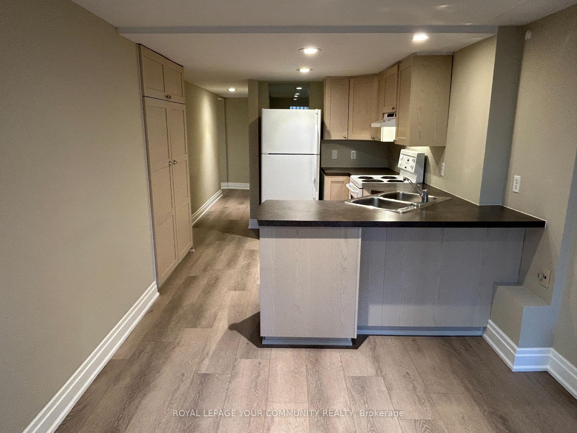 Photo 5 of Unit Lower, 2 Rougecrest Drive, Markham, Markham Village — HOMEH