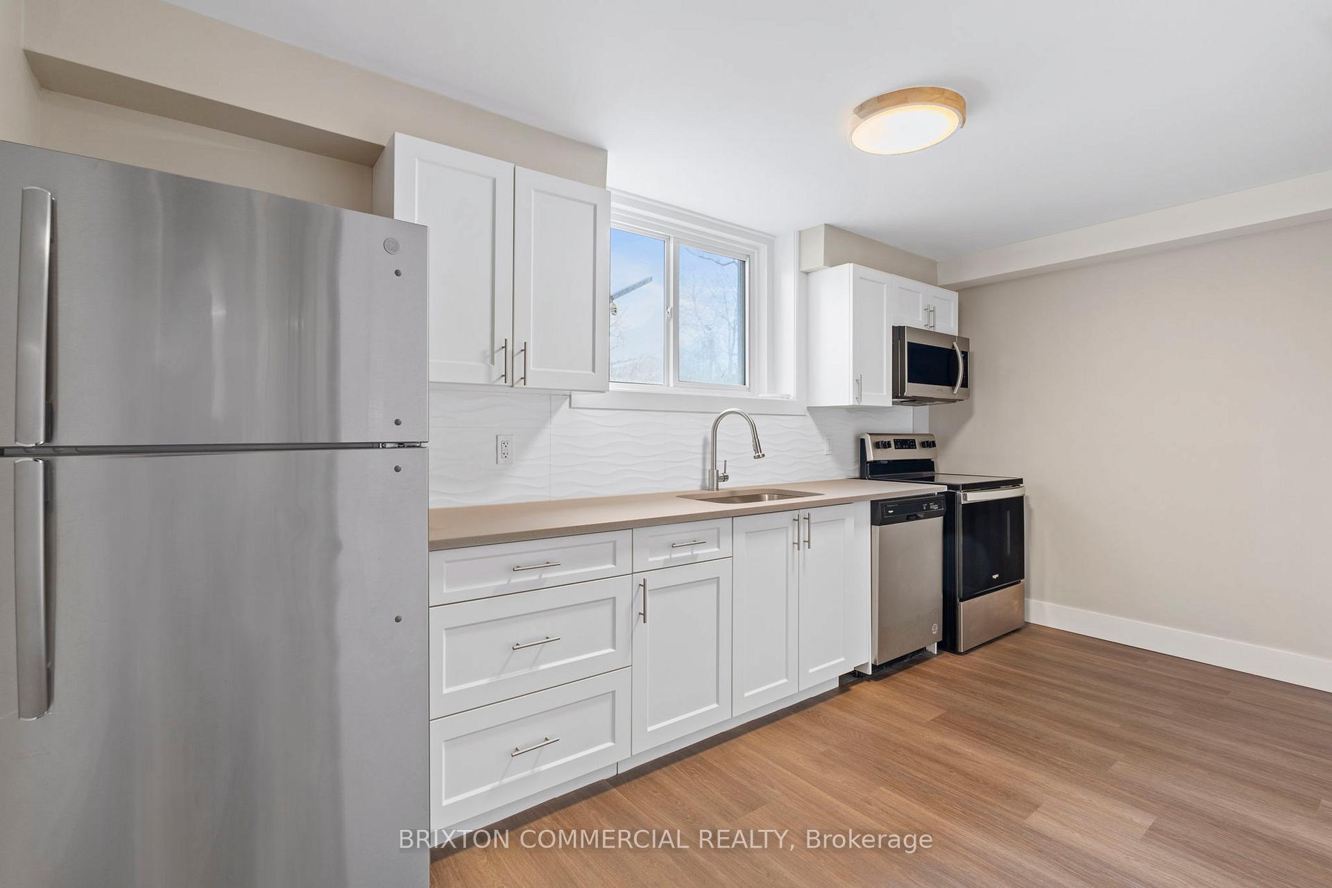Photo 3 of Unit 3, 586 Victoria Street S, Kitchener — HOMEH