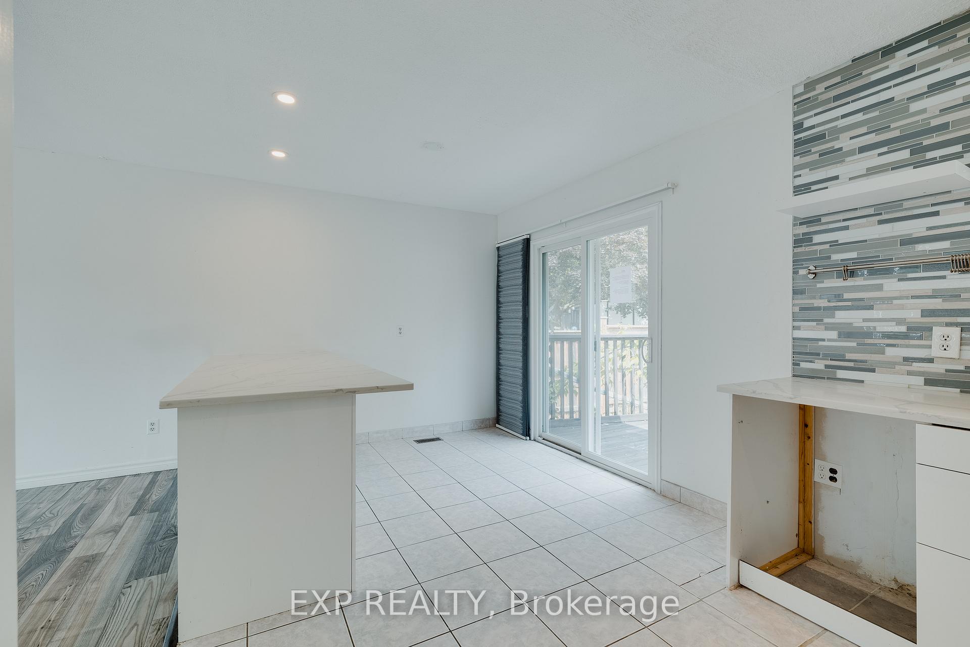 Photo 11 of 595 Pioneer Drive, Kitchener — HOMEH