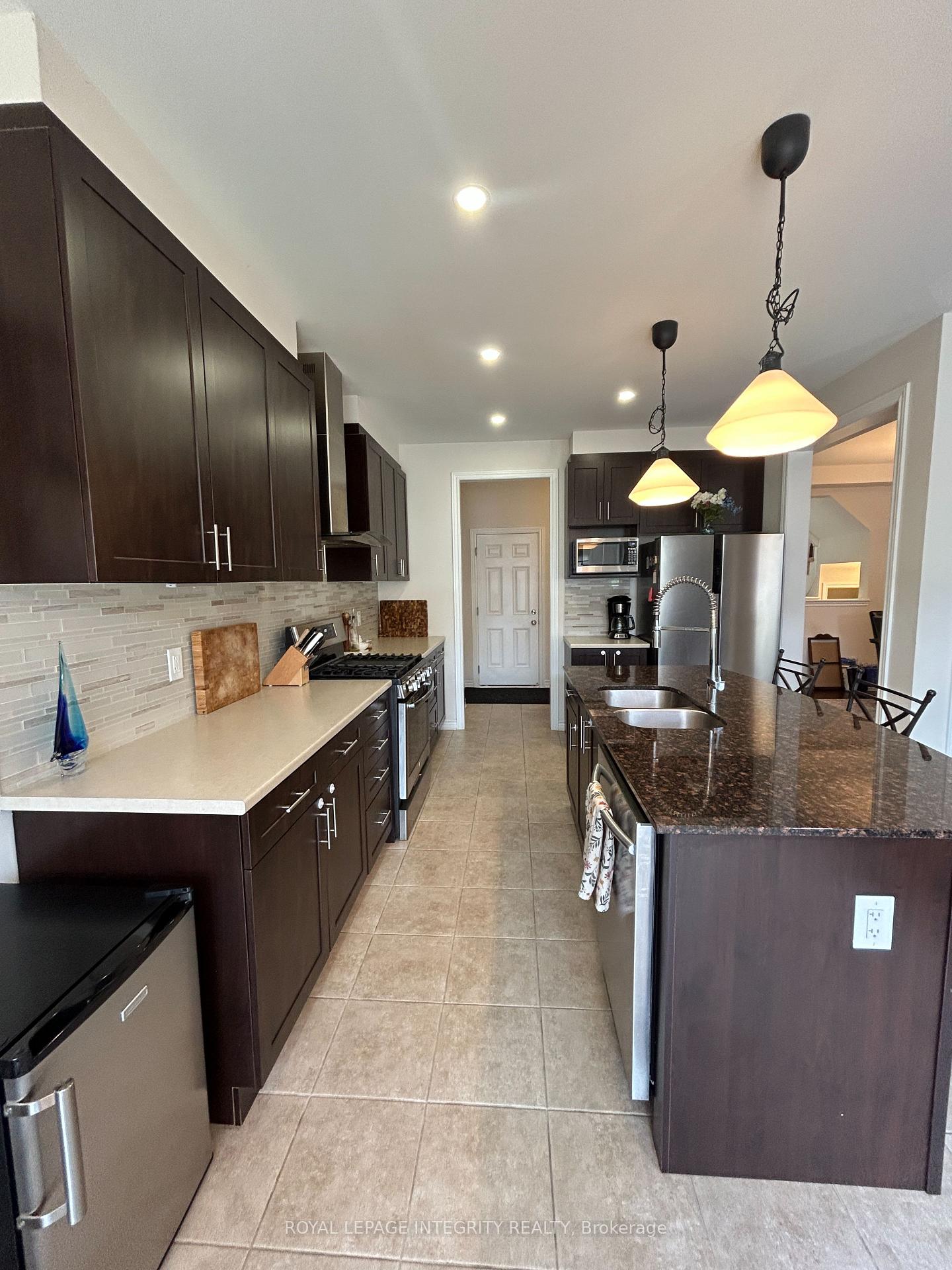 Photo 9 of 345 Rouncey Road, Ottawa, Kanata - Emerald Meadows/Trailwest — HOMEH