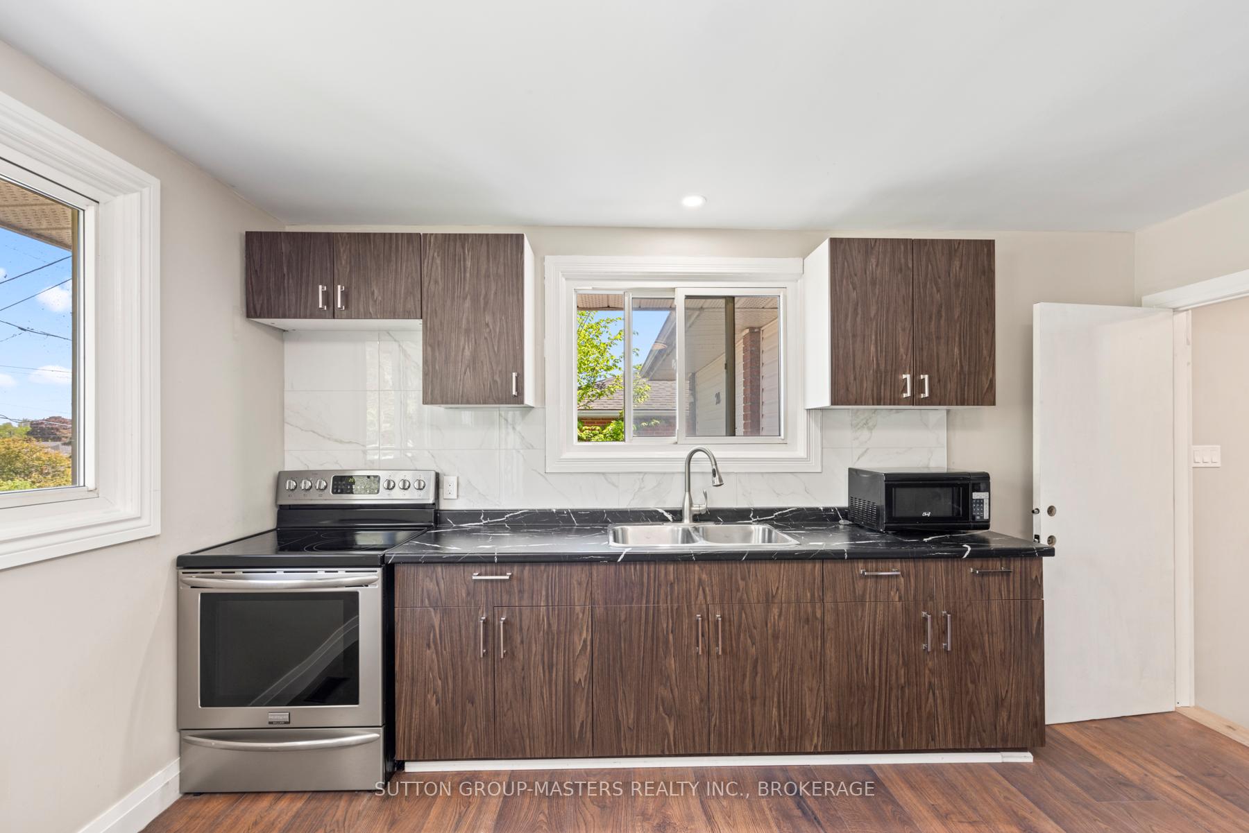Photo 18 of 20 Guy Street, Kingston, East of Sir John A. Blvd — HOMEH