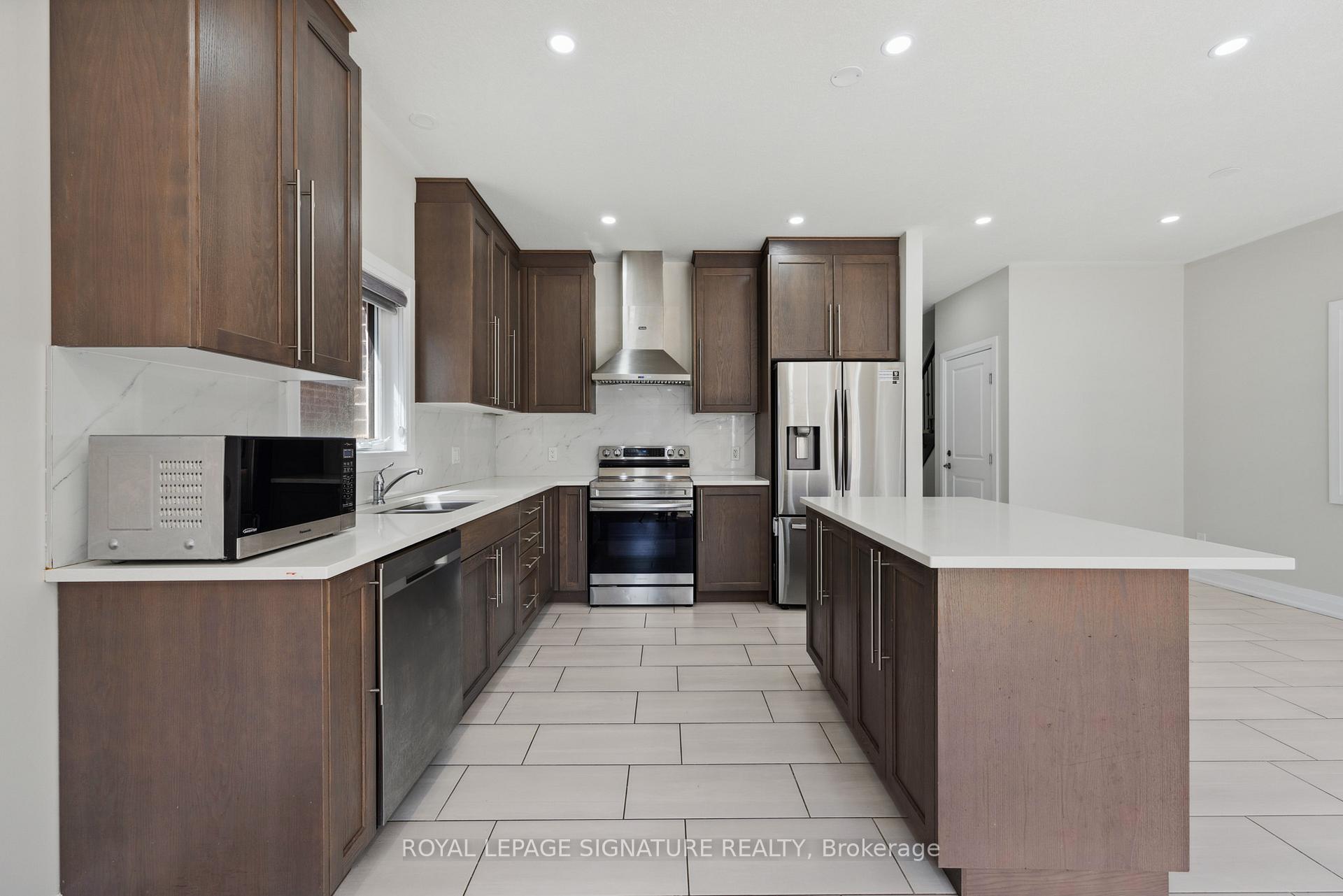 Photo 11 of 135 Ian Ormston Drive, Kitchener — HOMEH