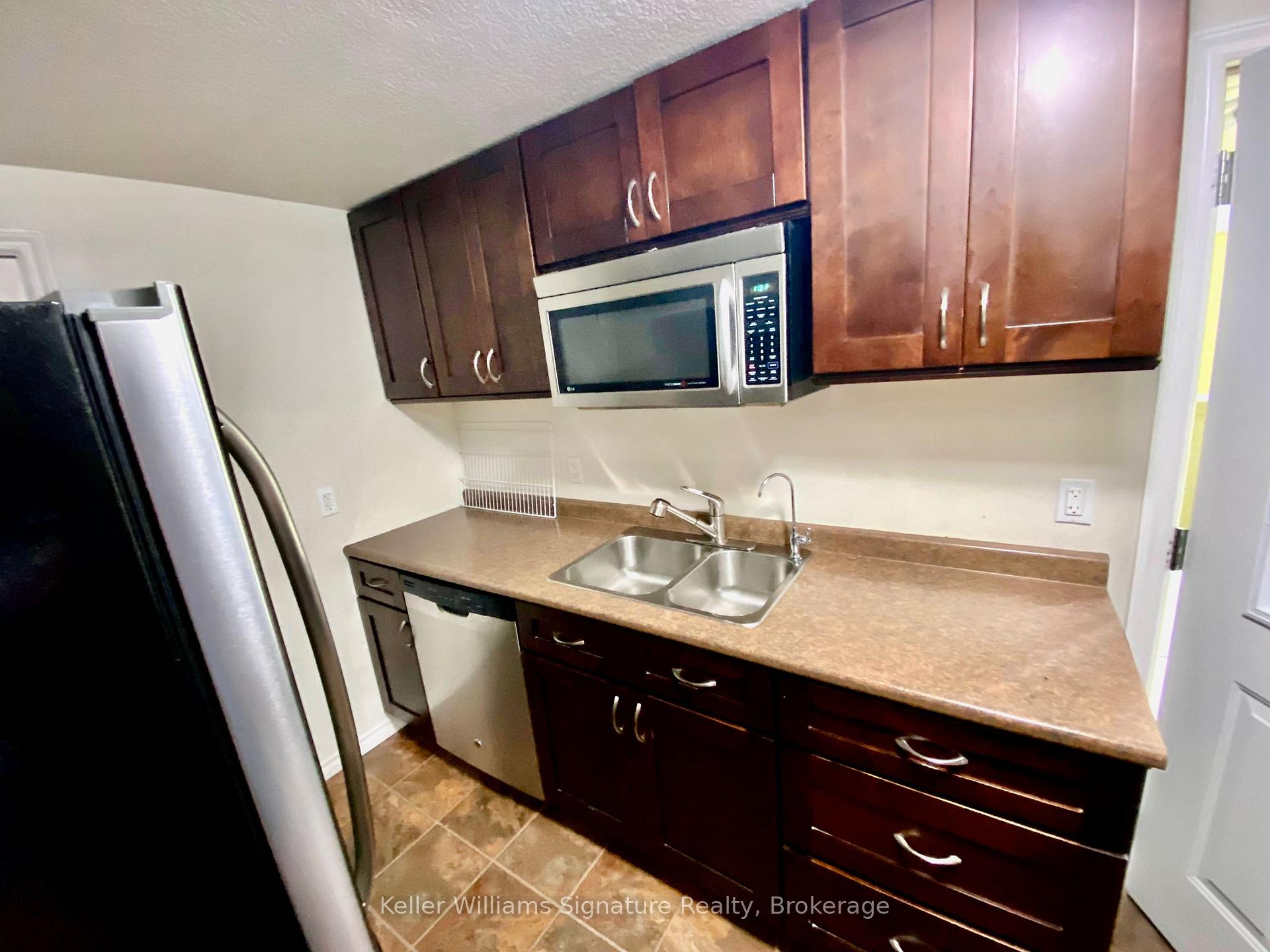 Photo 5 of Unit Bsmt, 68 Isabella Street, Kitchener, Larentian West — HOMEH