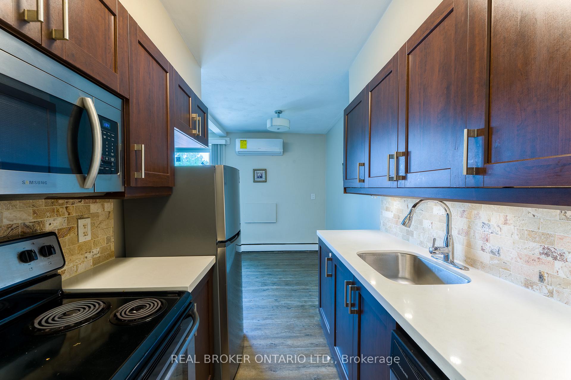 Photo 4 of Unit 402, 326 Hunter Street E, Hamilton, Stinson — HOMEH
