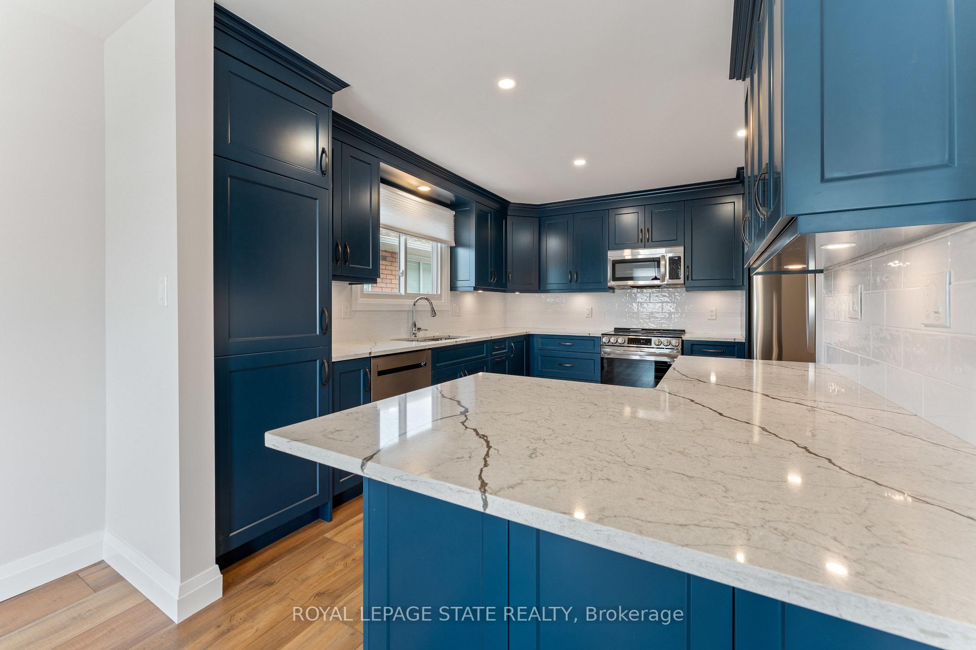 Photo 11 of Unit Upper Level, 144 Ravenbury Drive, Hamilton, Randall — HOMEH