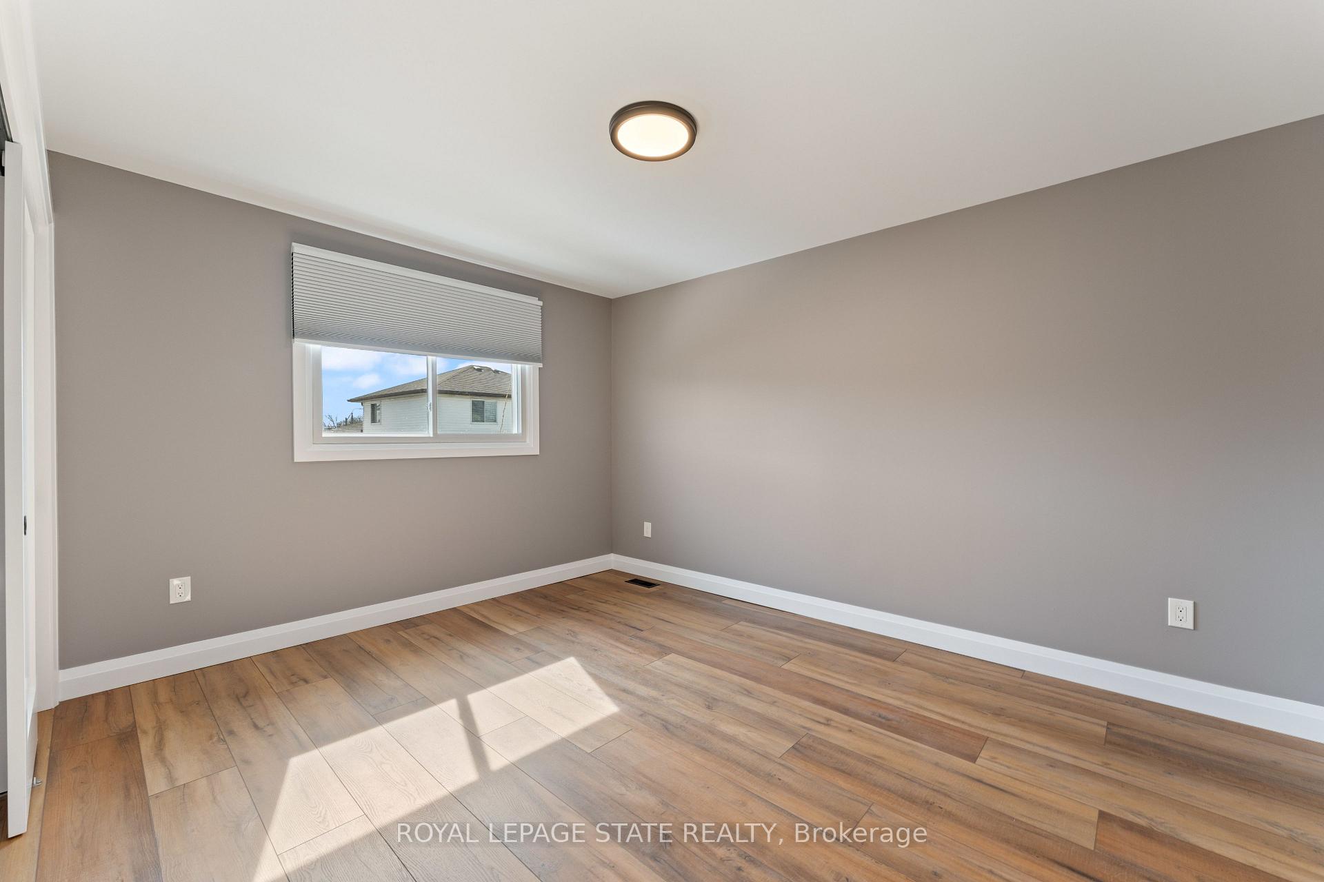 Photo 16 of Unit Upper Level, 144 Ravenbury Drive, Hamilton, Randall — HOMEH