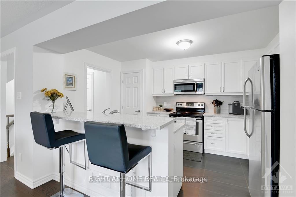 Photo 9 of 593 Foxlight Circle, Ottawa, Kanata - Emerald Meadows/Trailwest — HOMEH