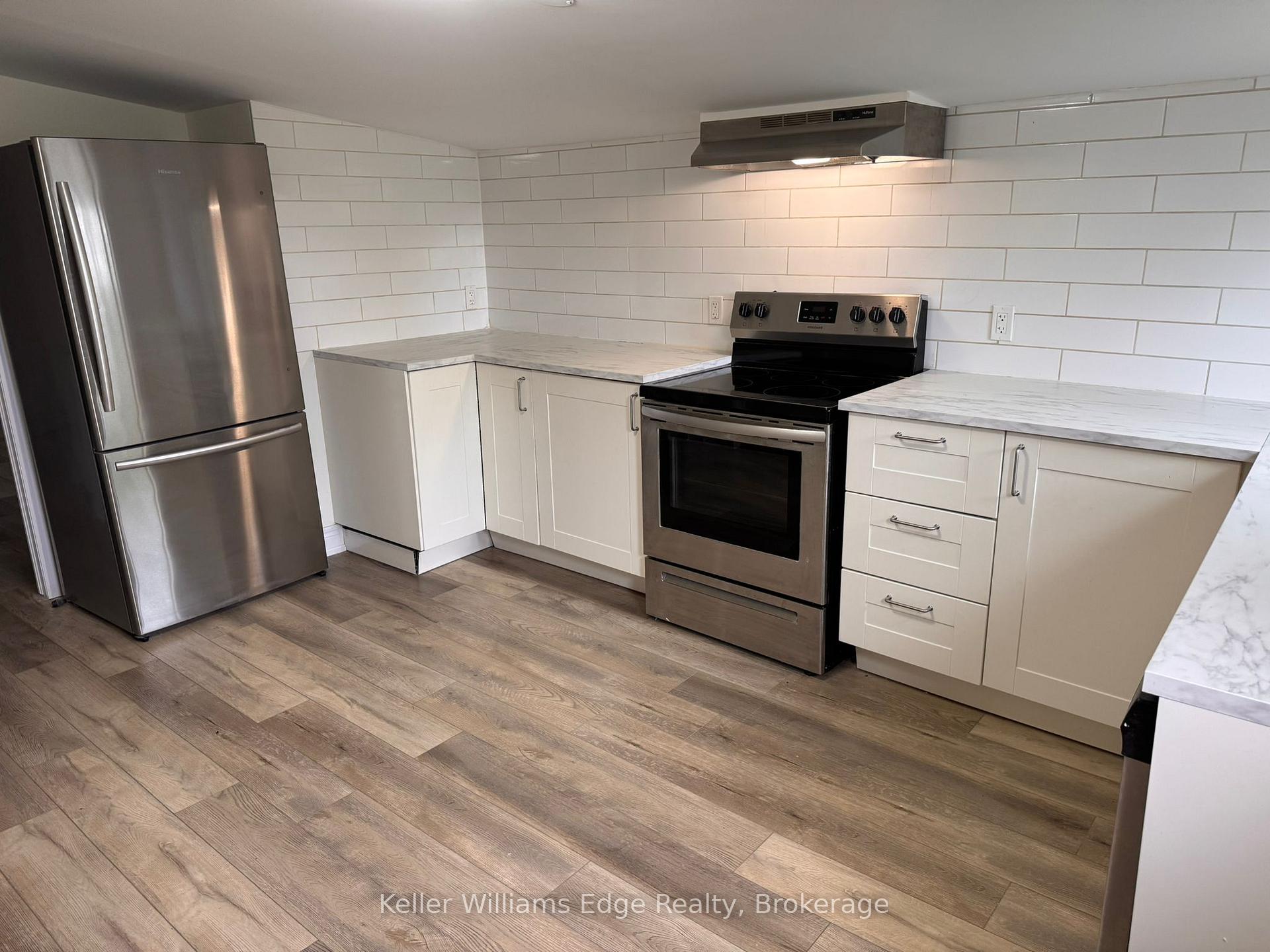 Photo 2 of Unit 2, 287 Hunter Street E, Hamilton, Corktown — HOMEH