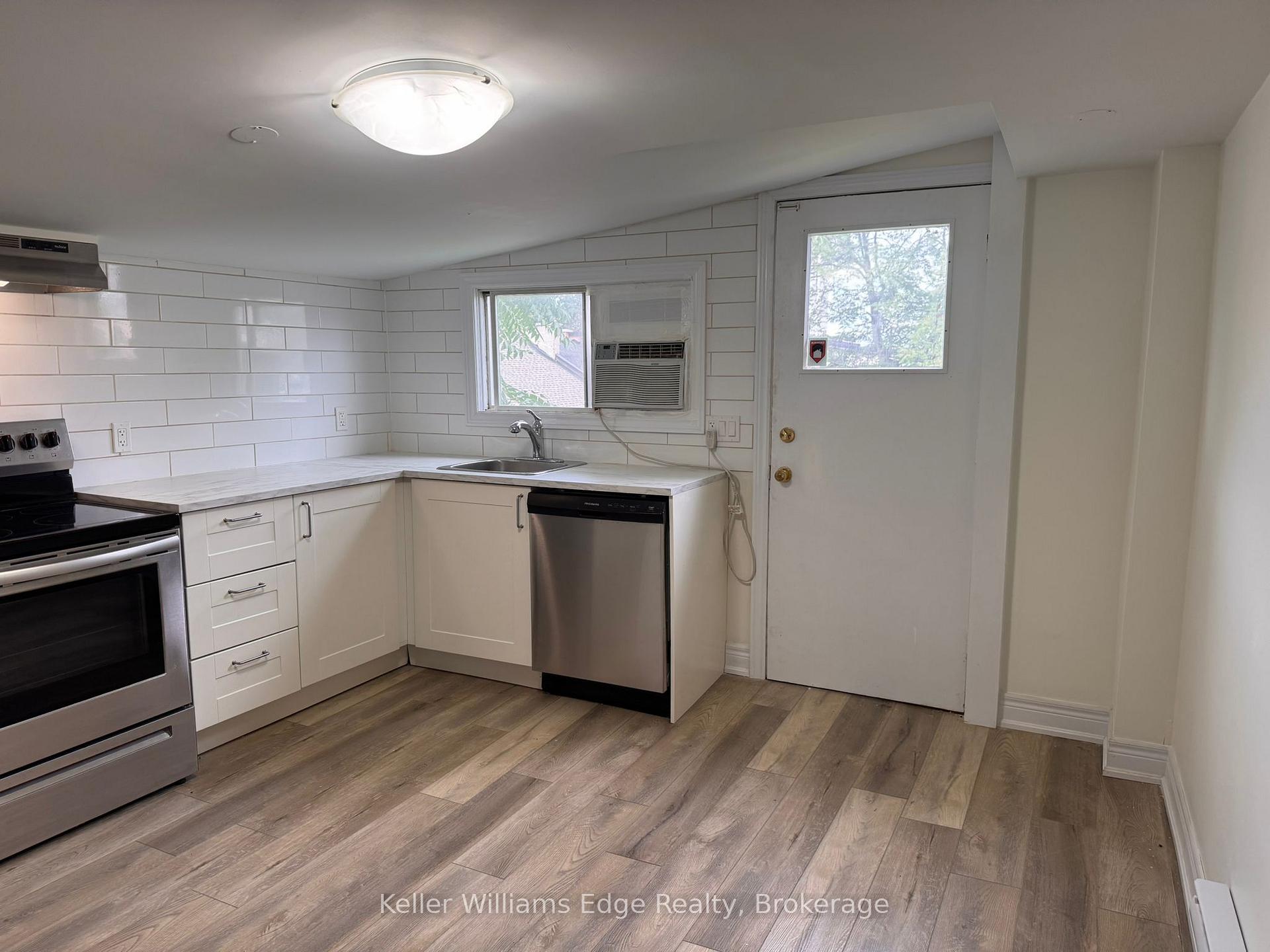 Photo 3 of Unit 2, 287 Hunter Street E, Hamilton, Corktown — HOMEH