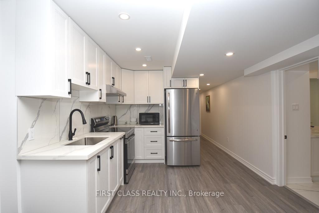 Photo 5 of Unit Bsmt, 35 Hubner Avenue, Markham, Berczy — HOMEH