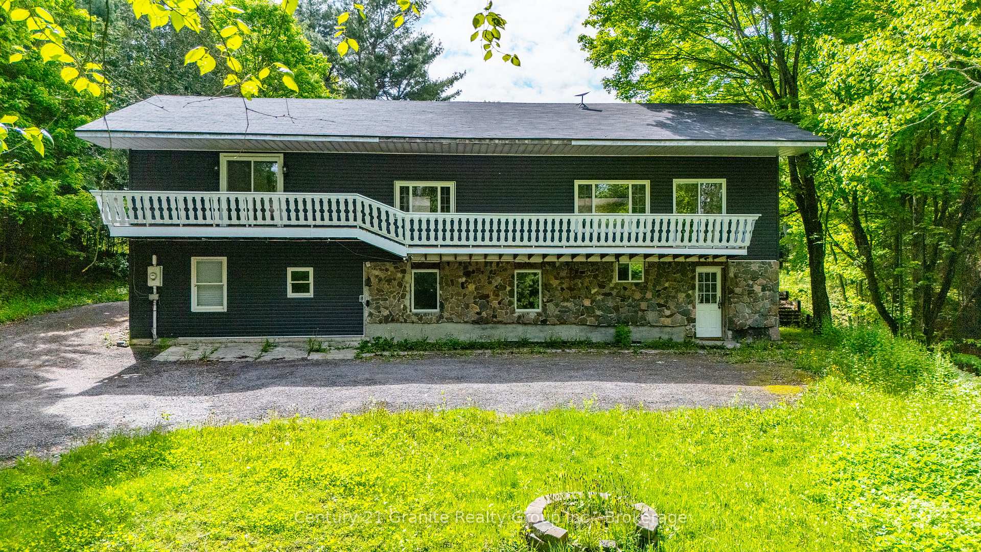 Front of 1630 Kashagawigamog Lake Road