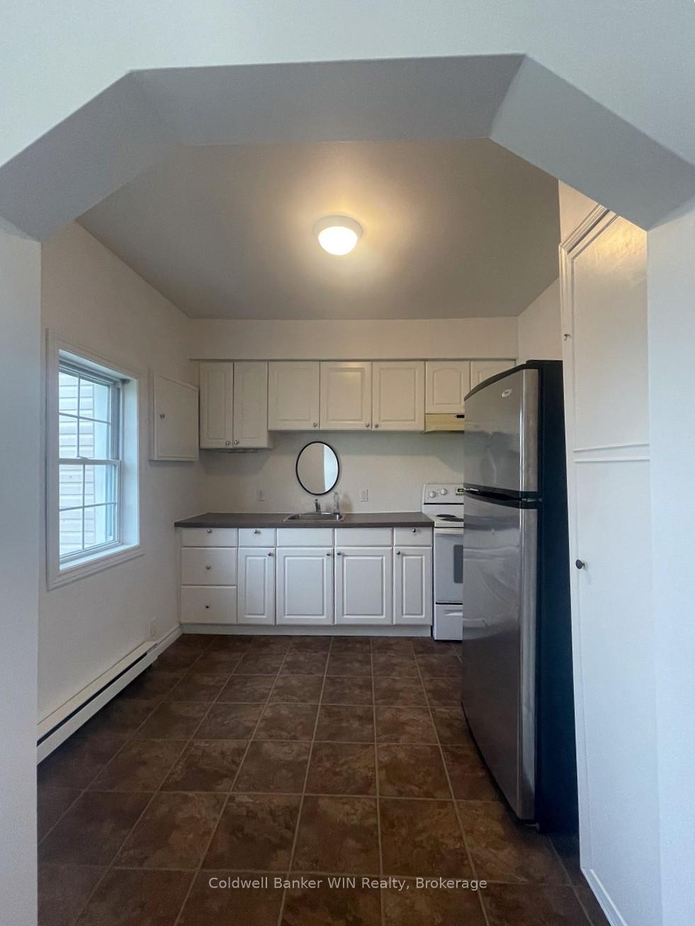 Photo 3 of Unit 2, 16 Queen Street N, Minto — HOMEH