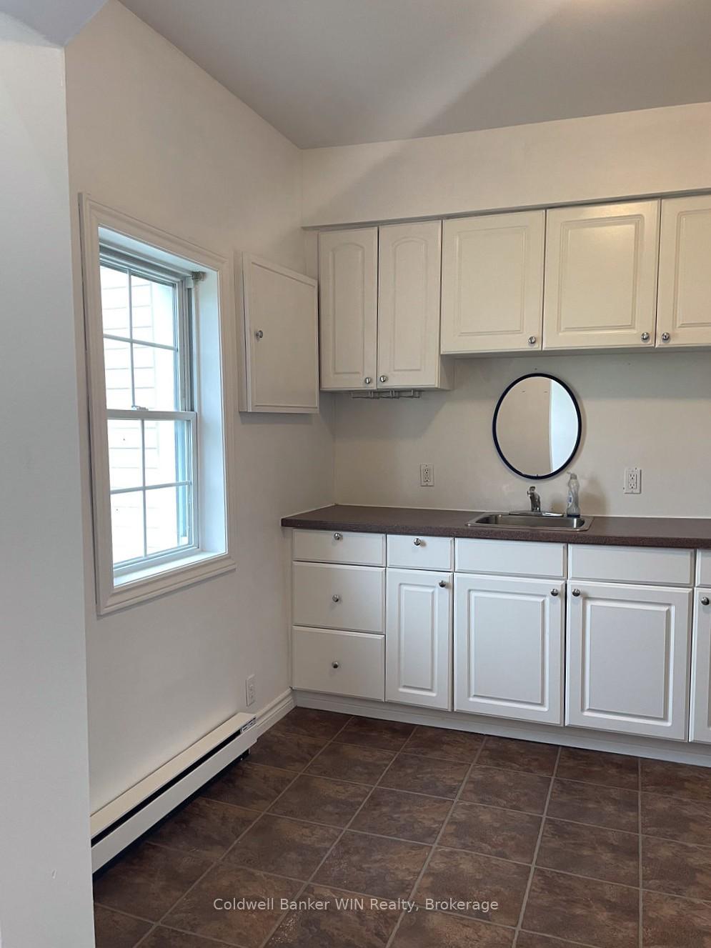 Photo 4 of Unit 2, 16 Queen Street N, Minto — HOMEH