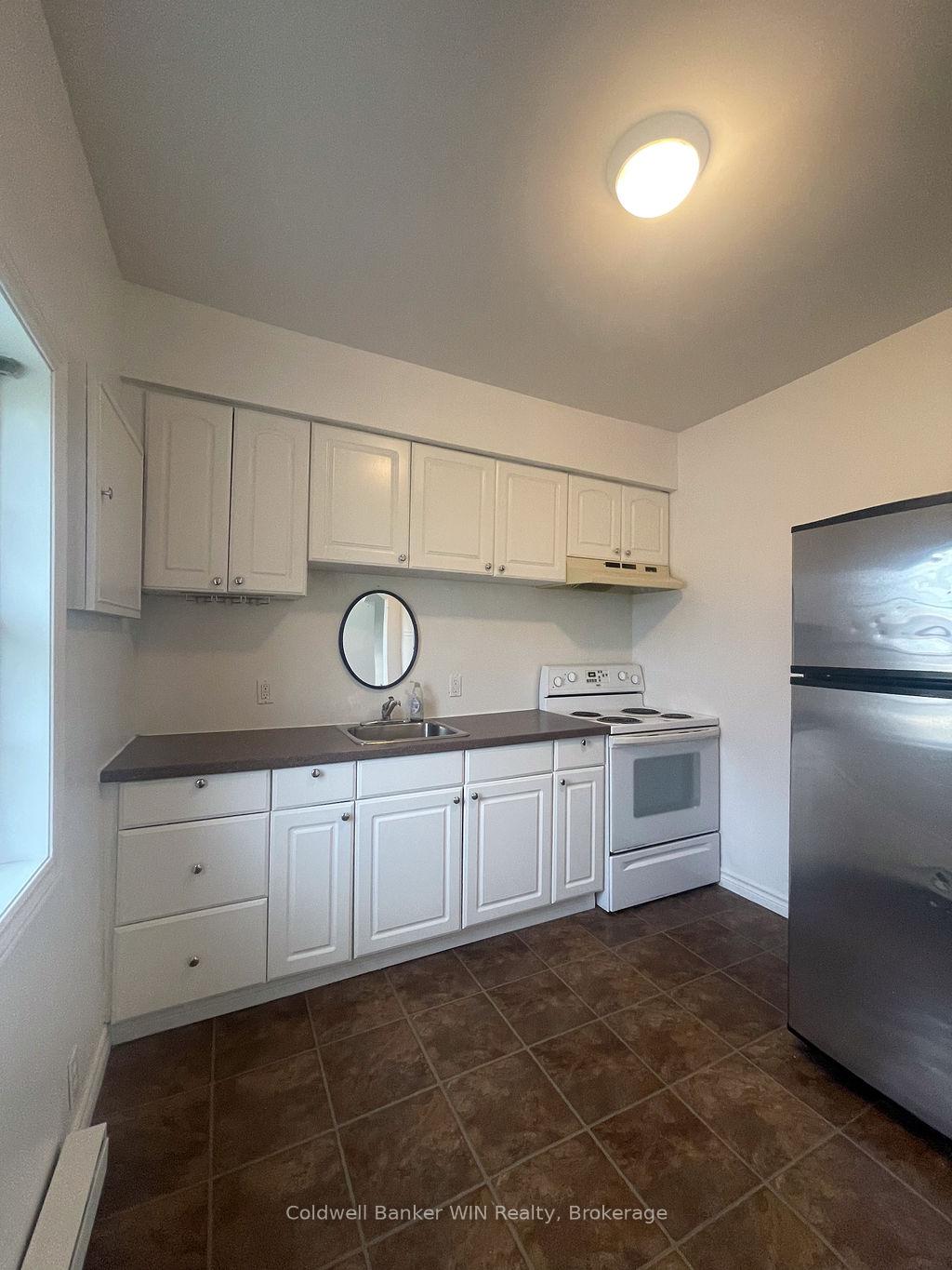 Photo 5 of Unit 2, 16 Queen Street N, Minto — HOMEH