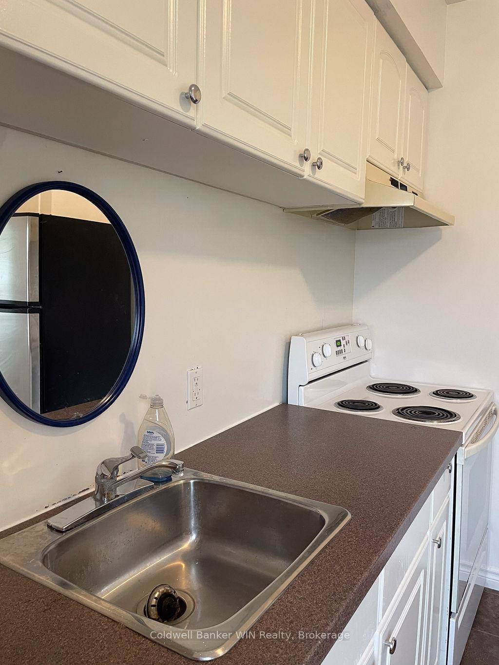 Photo 6 of Unit 2, 16 Queen Street N, Minto — HOMEH