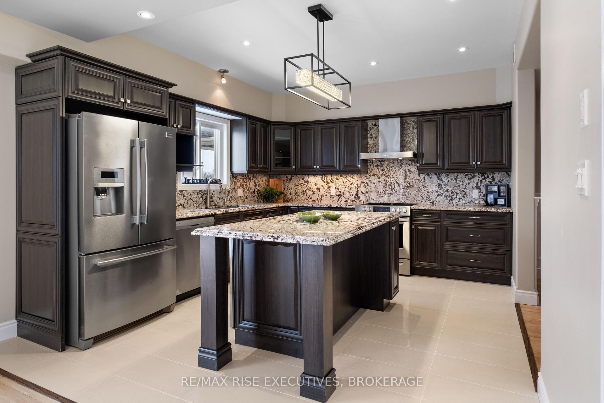 Photo 10 of 734 Kananaskis Drive, Kingston, City Northwest — HOMEH