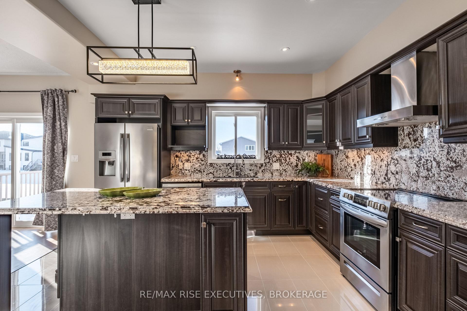 Photo 12 of 734 Kananaskis Drive, Kingston, City Northwest — HOMEH