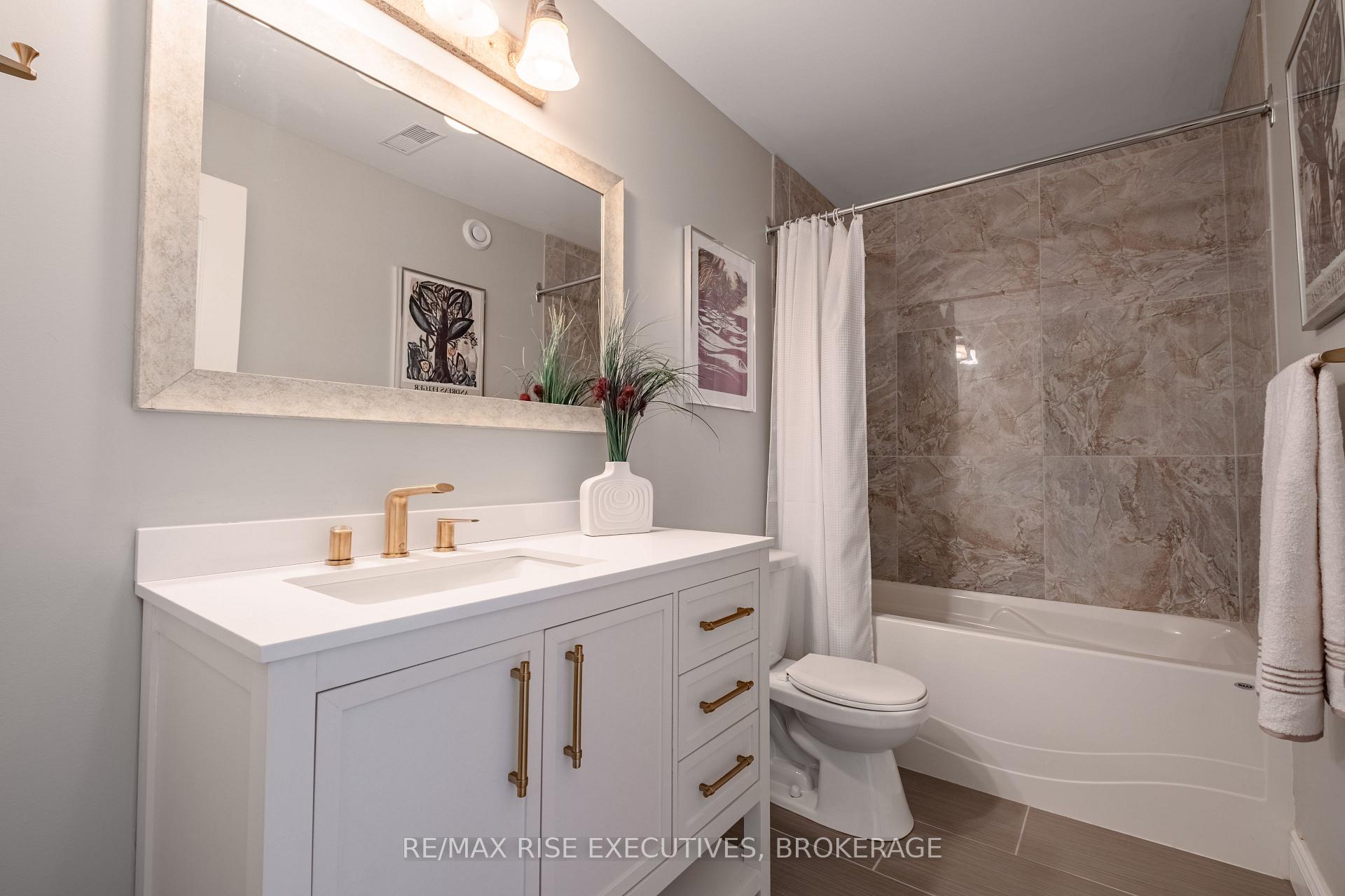 Photo 41 of 734 Kananaskis Drive, Kingston, City Northwest — HOMEH