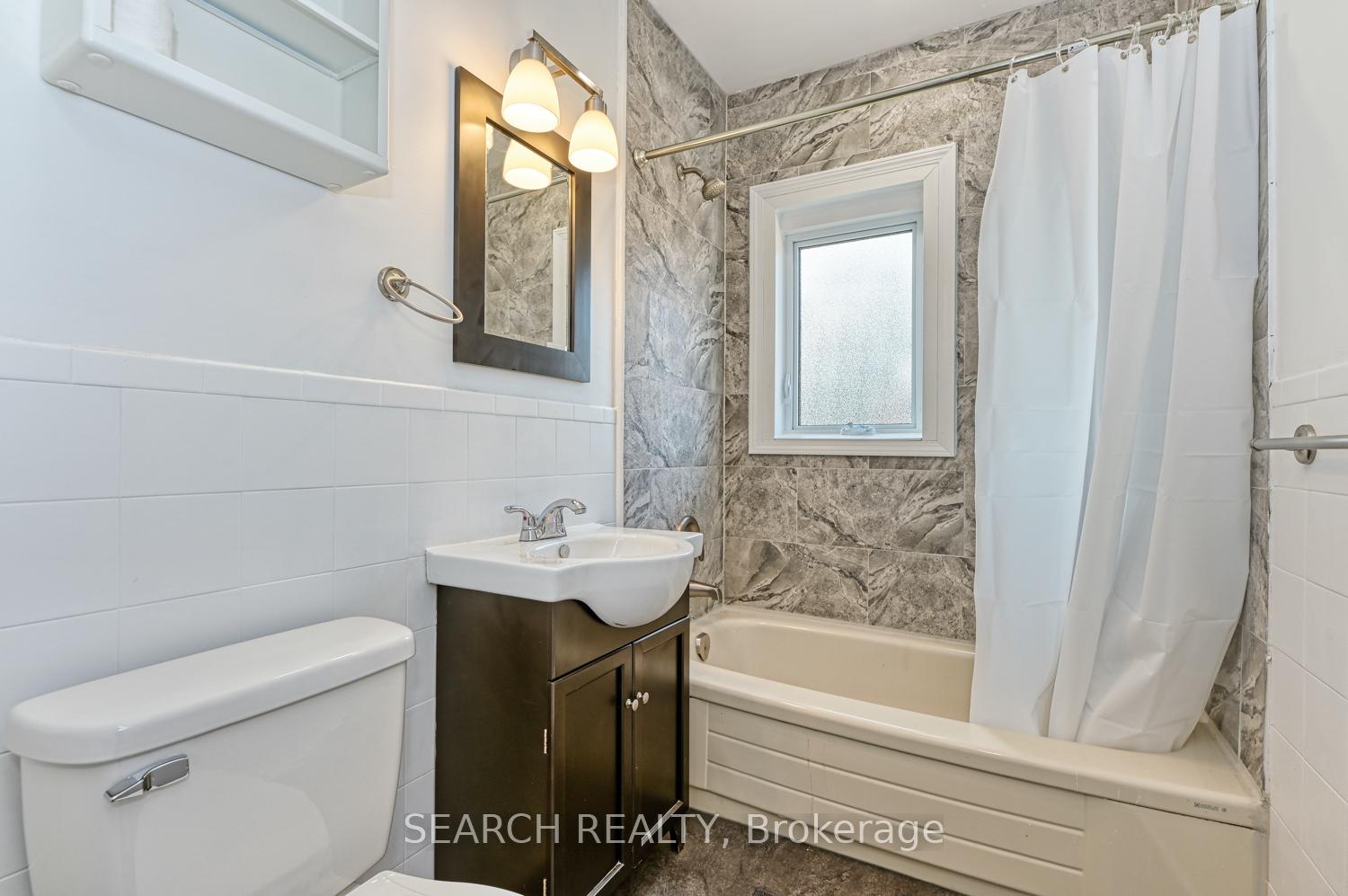 Photo 6 of Unit 1, 701 Brighton Avenue, Hamilton, Parkview — HOMEH