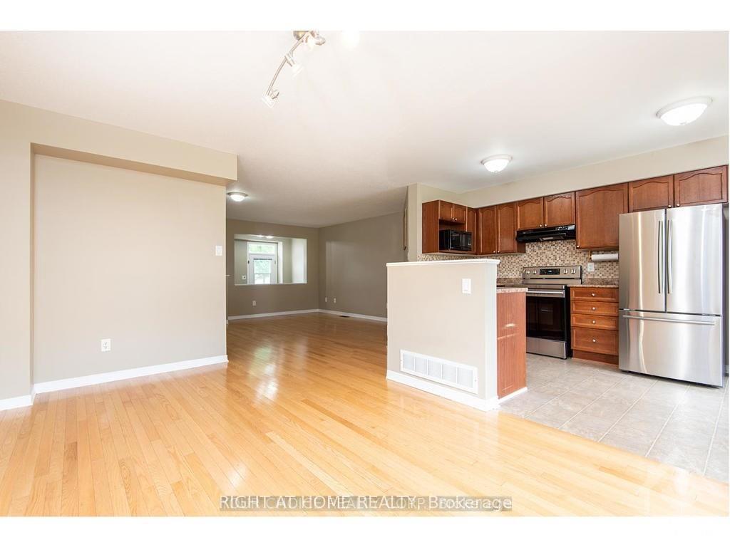 Photo 5 of 557 Aberfoyle Circle, Ottawa, Kanata - Morgan's Grant/South March — HOMEH