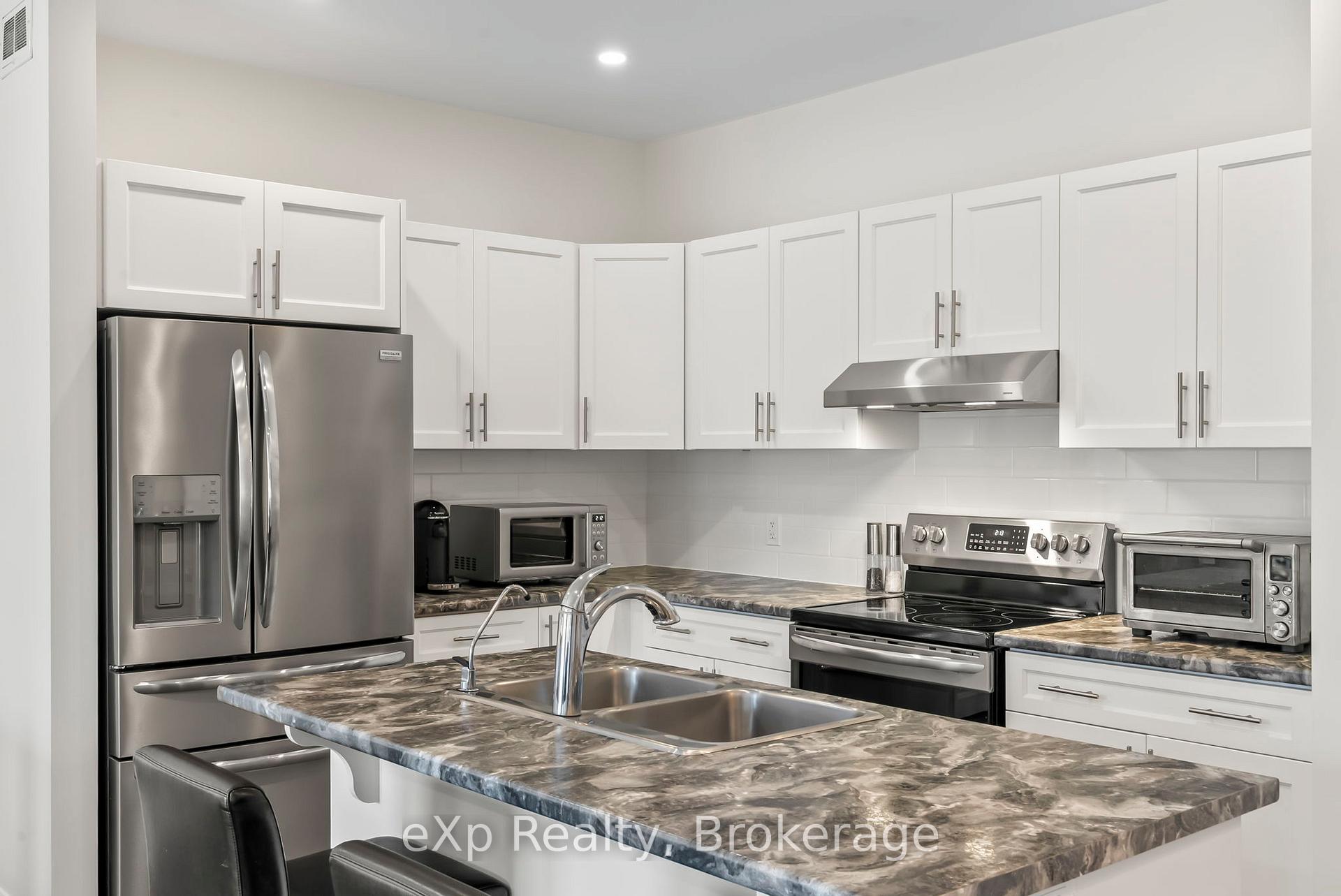 Photo 17 of Unit 4, 24 George Street N, Minto — HOMEH