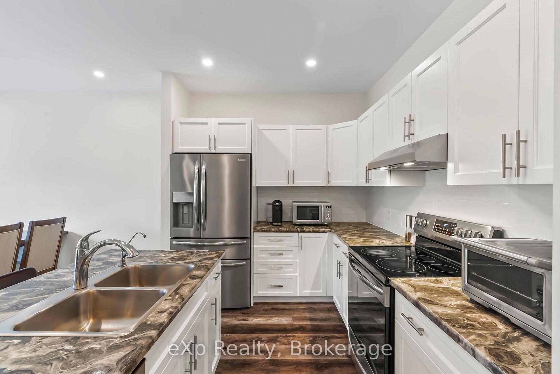 Photo 18 of Unit 4, 24 George Street N, Minto — HOMEH
