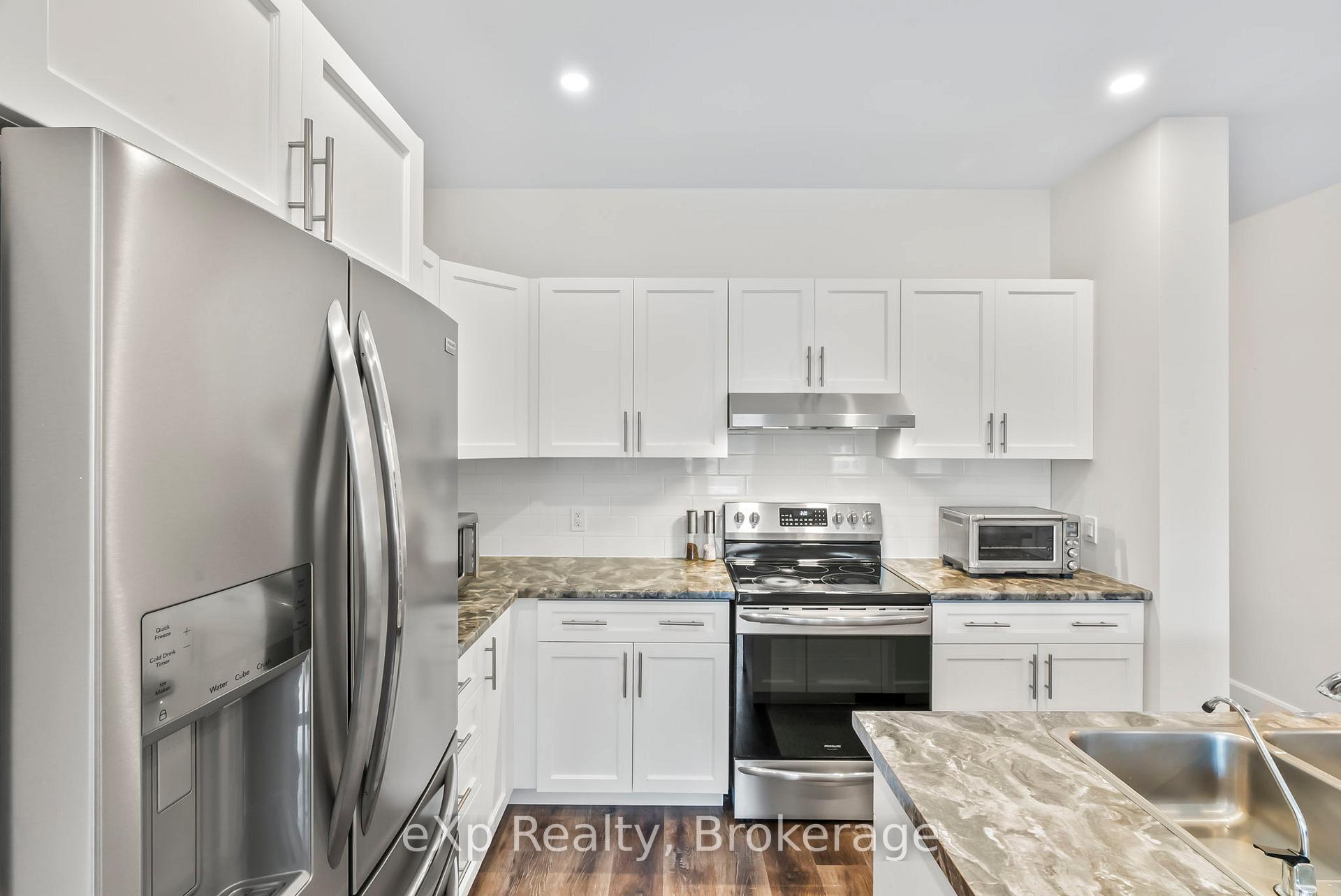 Photo 20 of Unit 4, 24 George Street N, Minto — HOMEH
