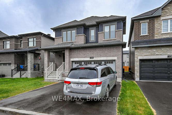 Front of 330 Elsie Macgill Walk W