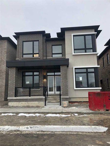 Front of 60 Rustle Woods Avenue