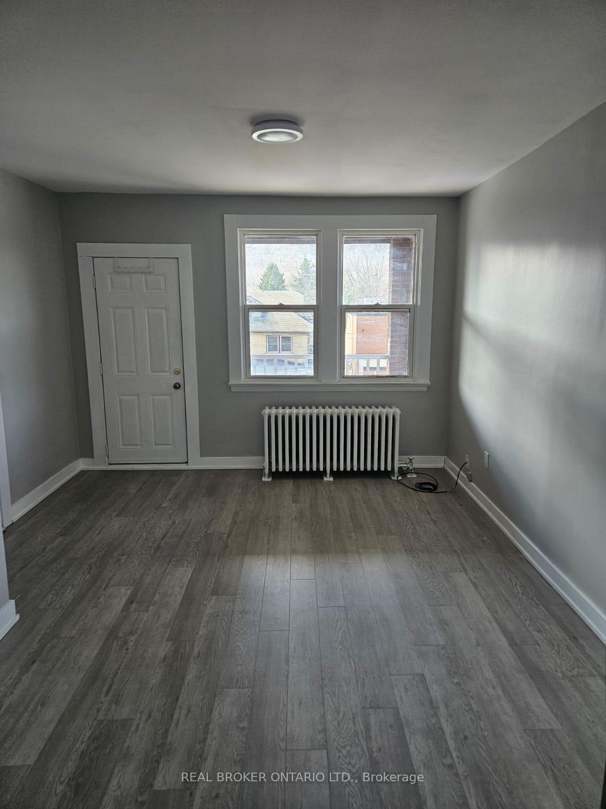Photo 3 of Unit 7, 917 Main Street E, Hamilton, Stripley — HOMEH
