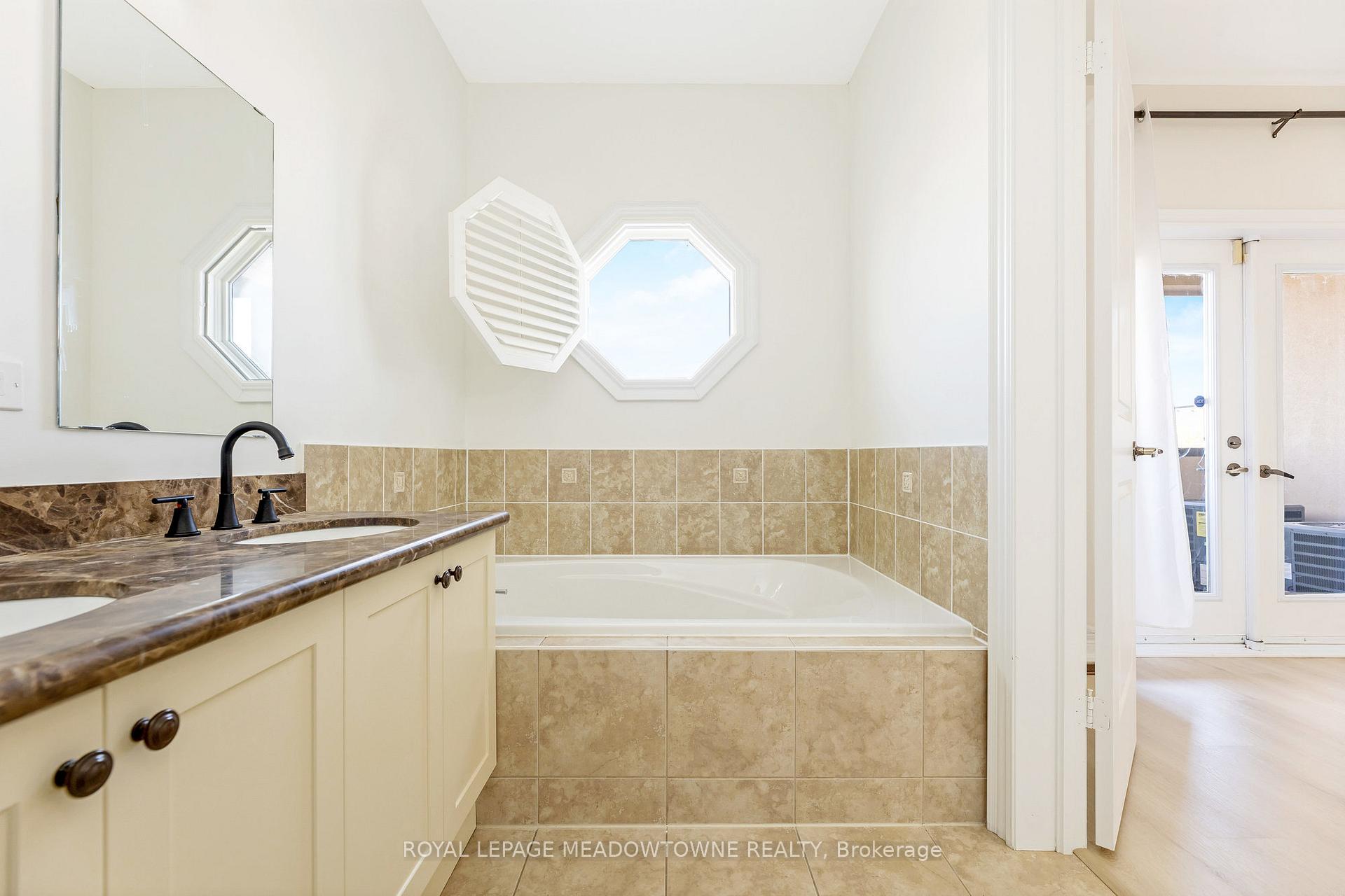 Photo 27 of Unit Upper, 9105 Derry Road W, Milton, Clarke — HOMEH