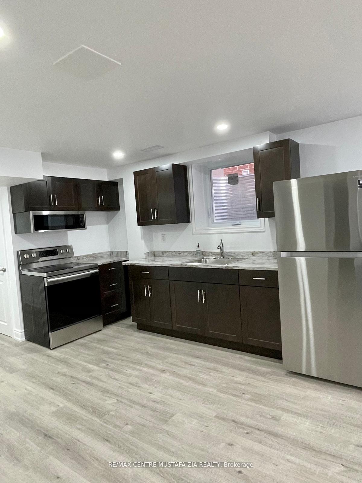 Photo 4 of Unit BSMT, 1556 Farmstead Drive, Milton, Ford — HOMEH
