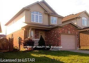 Front of 671 Oakcrossing Road