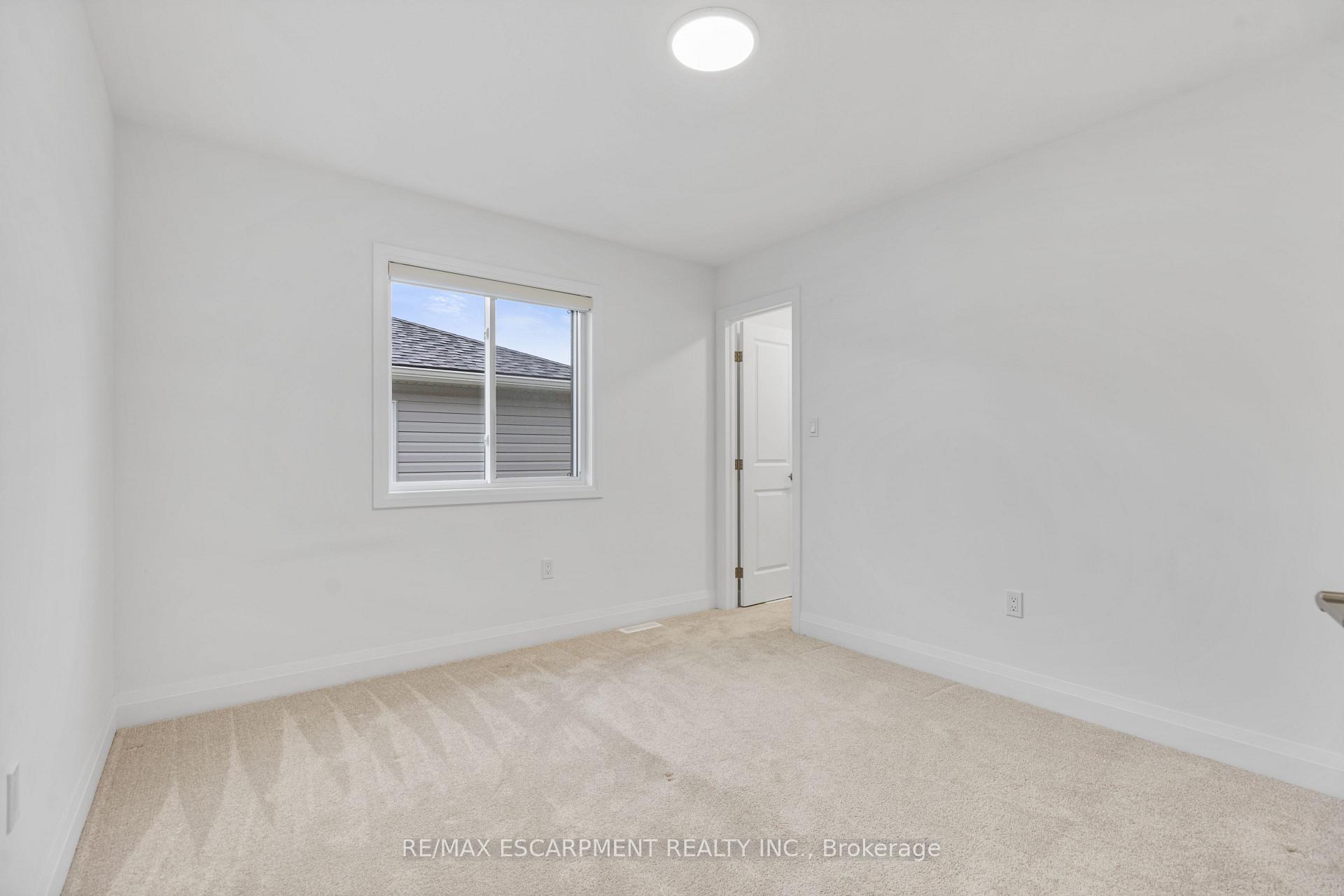 Photo 19 of 128 Basil Crescent, Middlesex Centre, Ilderton — HOMEH