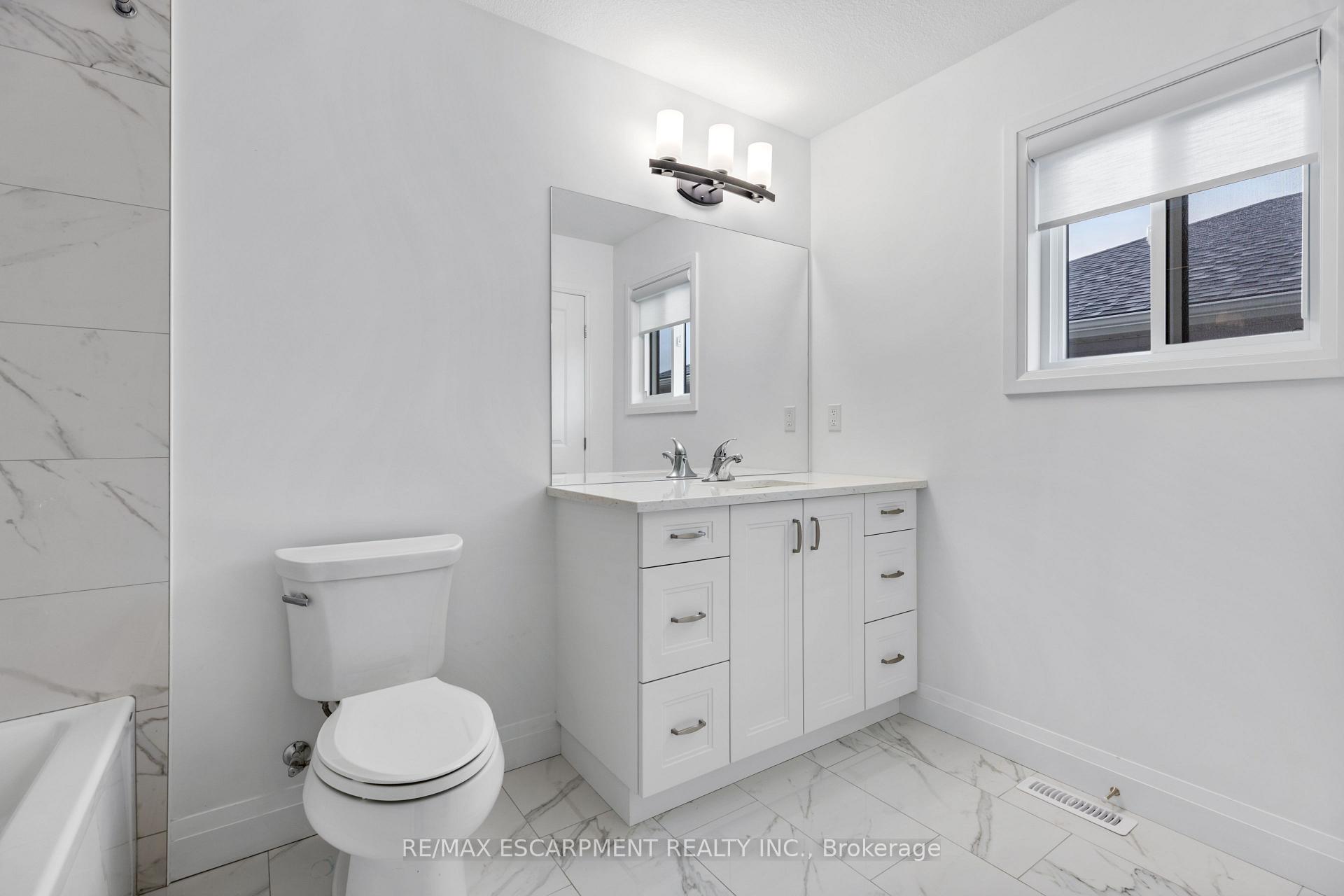 Photo 23 of 128 Basil Crescent, Middlesex Centre, Ilderton — HOMEH