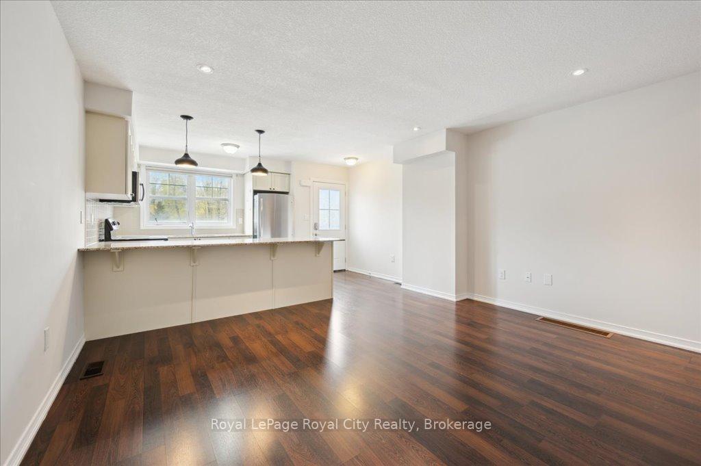 Photo 5 of Unit 86, 701 Homer Watson Boulevard, Kitchener, Trillium Industrial Park — HOMEH