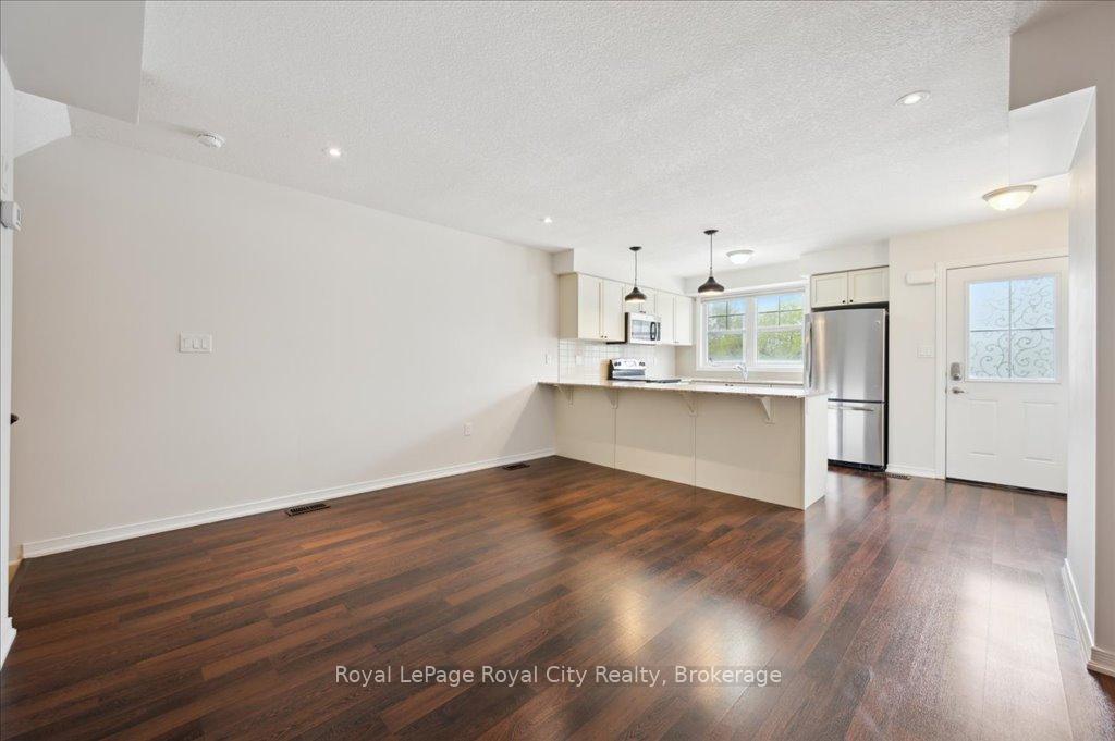 Photo 6 of Unit 86, 701 Homer Watson Boulevard, Kitchener, Trillium Industrial Park — HOMEH