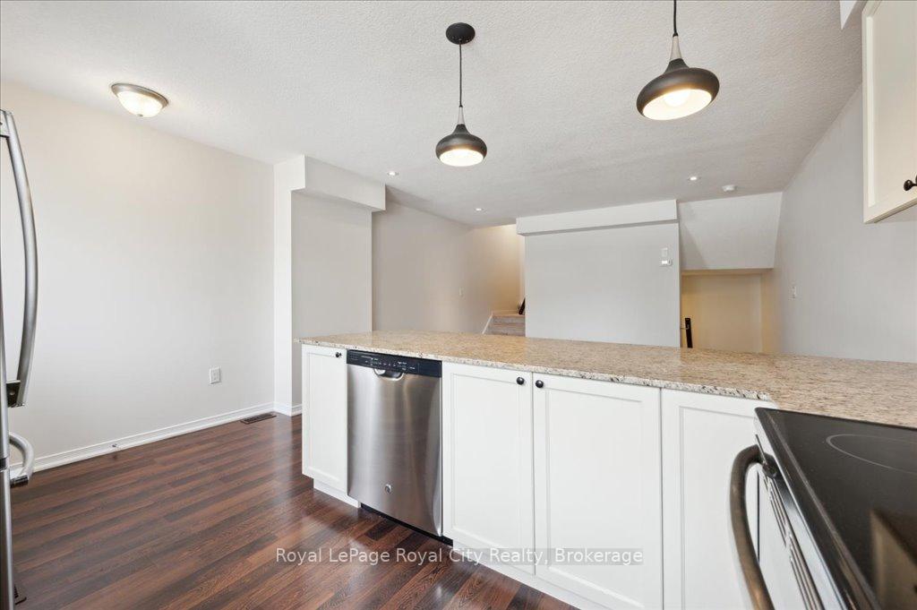 Photo 14 of Unit 86, 701 Homer Watson Boulevard, Kitchener, Trillium Industrial Park — HOMEH