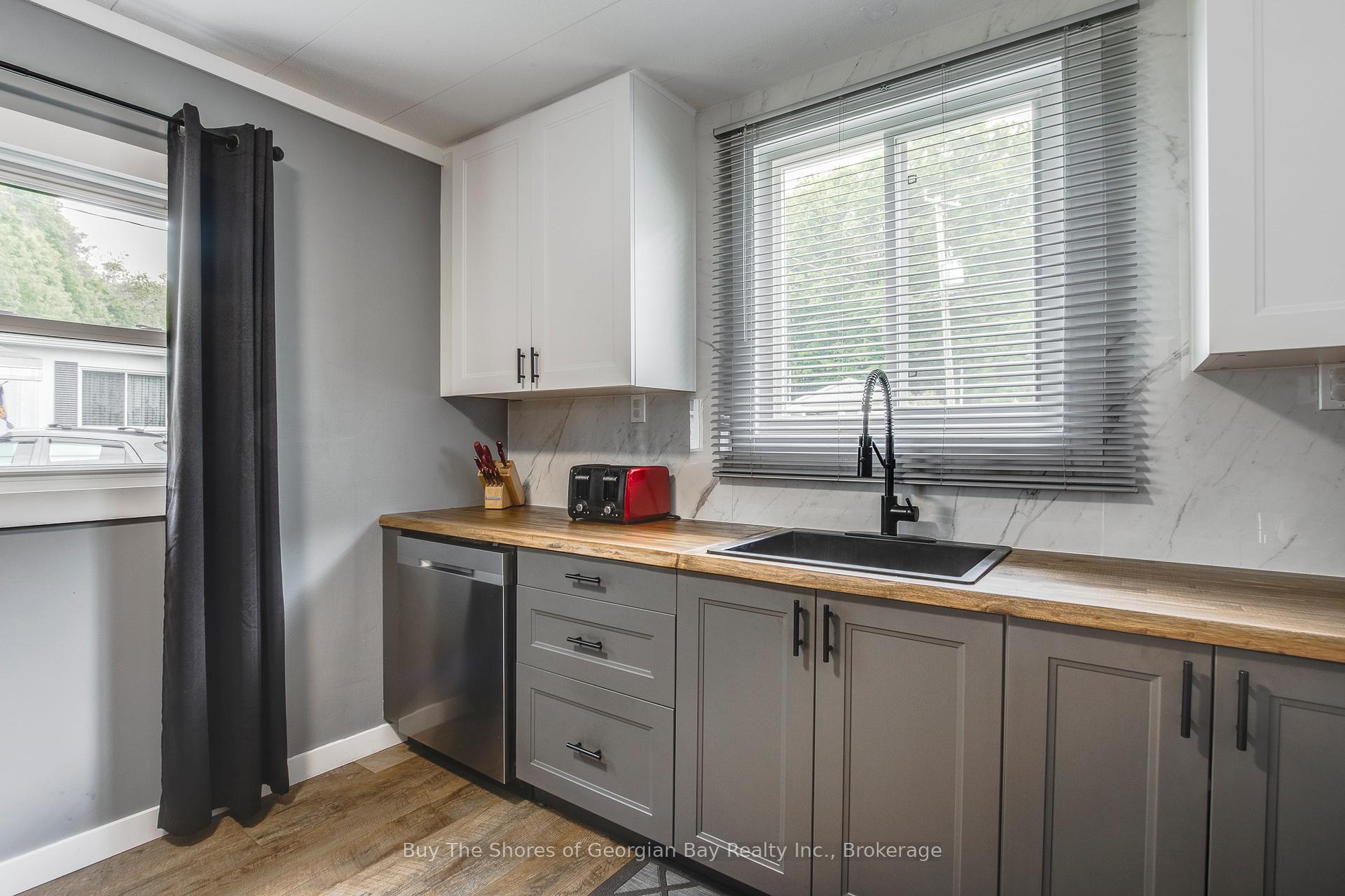 Photo 11 of Unit 59, 525 Midland Point Road, Midland — HOMEH