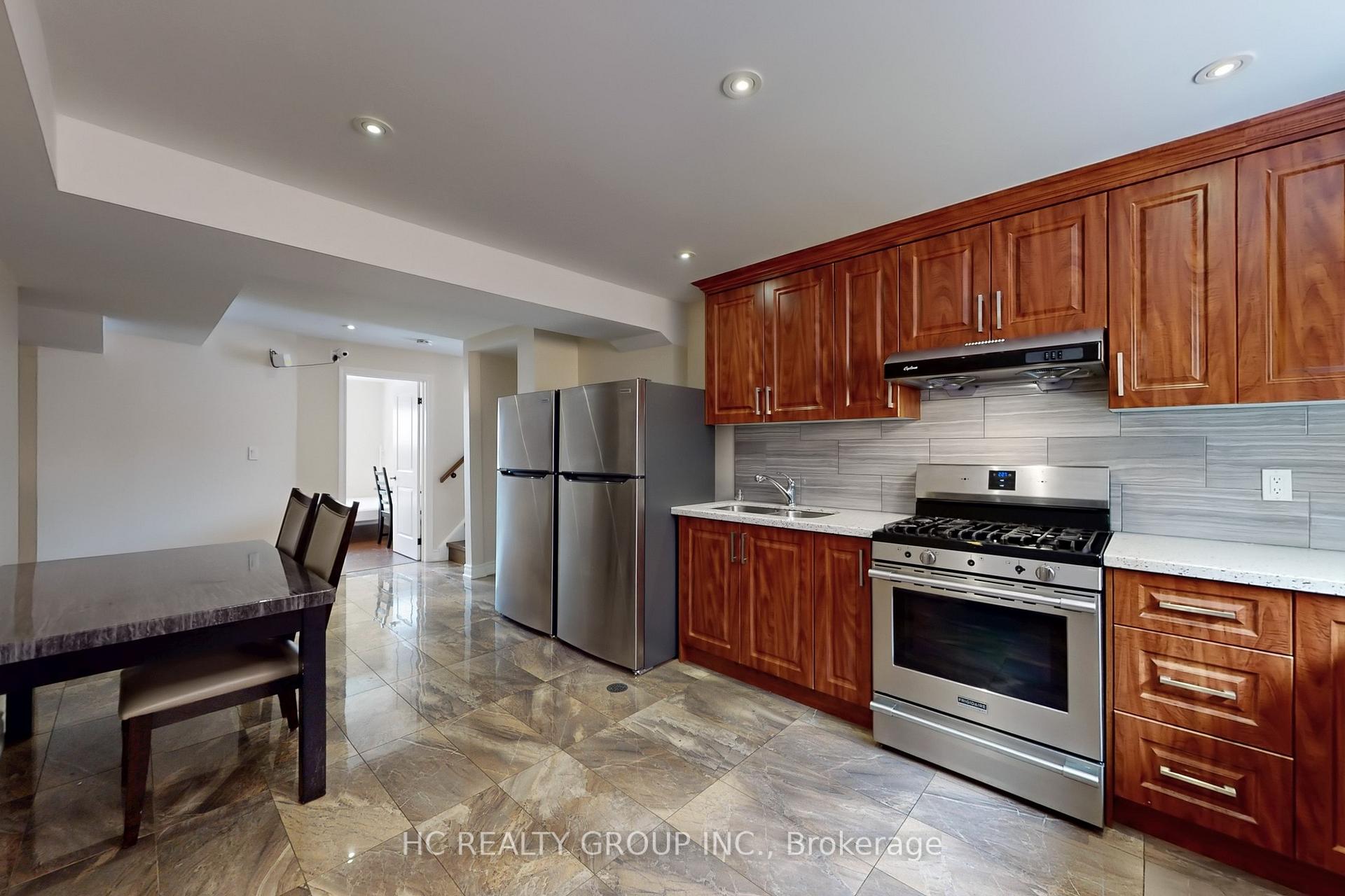 Photo 4 of Unit Bsmt, 2 Heathrow Court, Markham, Milliken Mills West — HOMEH