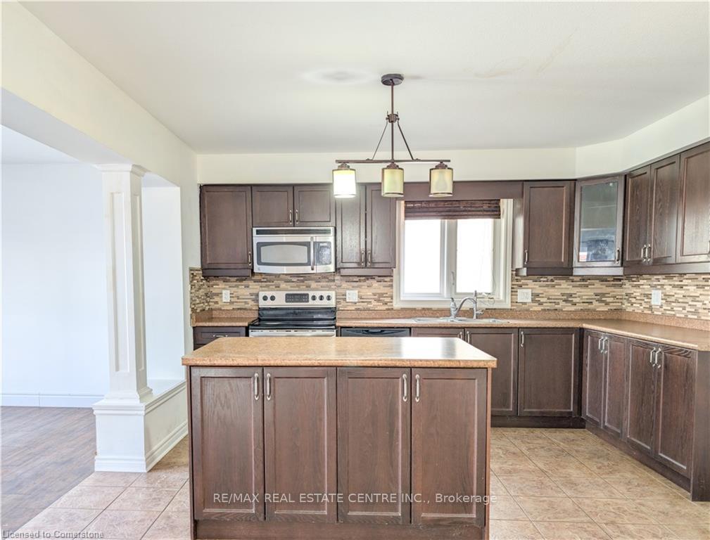 Photo 6 of 542 Isaiah Crescent, Kitchener, Larentian West — HOMEH