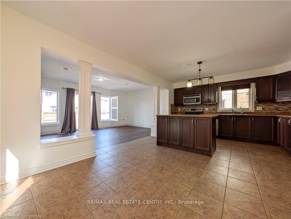 Photo 8 of 542 Isaiah Crescent, Kitchener, Larentian West — HOMEH