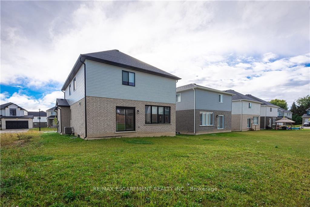 Photo 34 of 128 Basil Crescent, Middlesex Centre, Ilderton — HOMEH