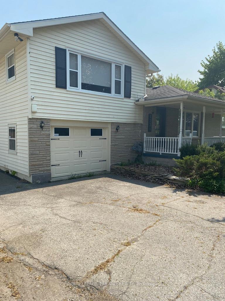 Front of 1231 Sunningdale Road E